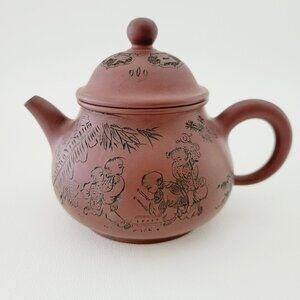Chinese Yixing Clay Teapot, Carved Figural Design Burnished Purple Clay 10fl. oz